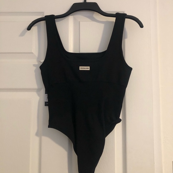 New black body suit perfect for the summertime. Size medium - Picture 9 of 13
